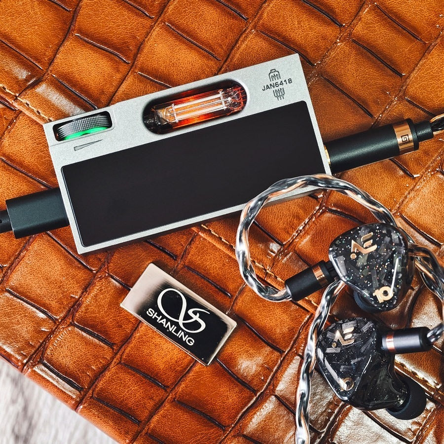 shanling ua7 portable usb dac amp silver with earphones